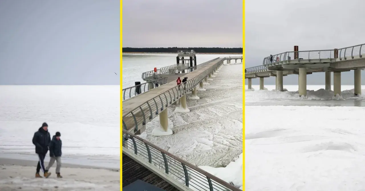 Spacerem po zamarzniętym Bałtyku, kiedy był skuty lodem. Widok na molo i plażę w zimowej scenerii.